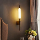 Lollipop Art Deco Wall Light Fixture illuminating a stylish room with modern and Art Deco elements.