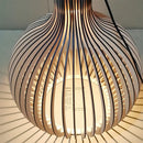 Nordic Retro Modern Wood Cage Pendant showcasing unique design and elegant lighting in a contemporary style.