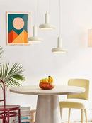 60s Scandinavian Style Kitchen Pendant Lamp above a modern dining table with a fruit bowl and stylish decor.