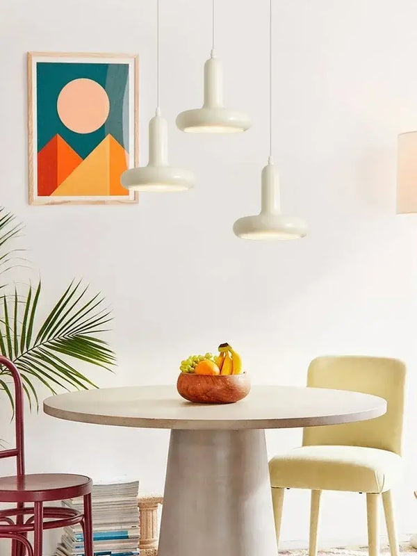 60s Scandinavian Style Kitchen Pendant Lamp above a modern dining table with a fruit bowl and stylish decor.