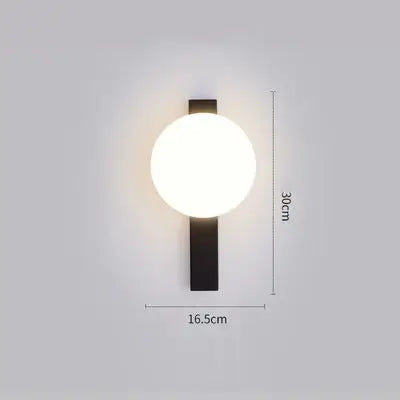Modern Simple Art Deco Revival Wall Lamp showcasing dimensions and design with round light and sleek black structure.