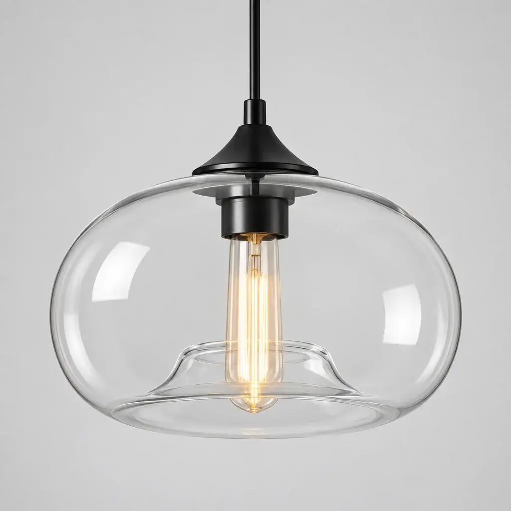 Nordic minimalist glass dome pendant light with a black cable and ceiling plate on a neutral wall