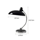 Bedside Table Lamp - Timeless Design and Modern Functionality, vintage-inspired Danish design, sleek black shade.