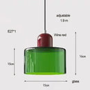 Colourful Glass Pendant (15cm x 16cm) in green glass with wine red holder, adjustable 1.9m, ideal for modern spaces.