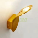 Wall Lamp: Mid-Century Modern Japanese Style in a sleek gold finish, featuring a leaf-inspired design.