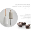 Colourful, modern, metal Danish Light Pendant showcasing minimalist design with elegant shapes and neutral colors.