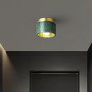 Italian Marble Downlight in Green or White Marble illuminating a modern ceiling in a stylish interior.