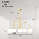 Modern Magic Beans 4-Head Gold LED Chandelier – Sophisticated Ceiling Light with 8 heads and frosted glass globes.