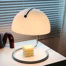 80s USB desk lamp in various colours with a chrome base and dome-shaped glass shade.