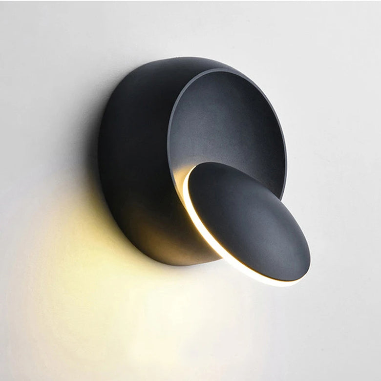 Hero Modern round black wall light fixture on a white background
