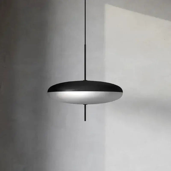 Nordic LED Pebble Pendant Light – Minimalist  Ceiling Lamp hanging in a modern interior with soft diffused lighting.