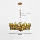 Luxurious Glass Disc Chandelier – 50s Chic featuring adjustable 50cm suspension and stunning amber glass discs.
