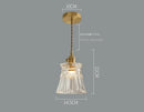 Elegant Glass Pendant Light with Brass Accents - Illuminate with Style dimensions, featuring a clear glass shade and brass accents.
