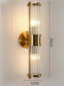 Unique Collection of Art Deco Sconces with elegant gold finish and crystal design, 50cm height and 12cm width.