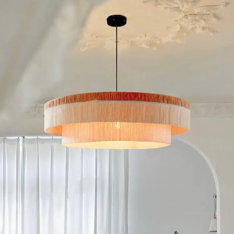 French Retro Grand Fringe Pendant Light – 80cm Vintage Beige Statement Chandelier hanging elegantly in a bright room.
