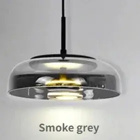 Retro 80s Transparent Large Pendant Lamp in smoke grey color casting warm light.
