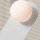 Discover the Vintage Elegance of the 70s-Inspired Metal and Glass Sconce featuring a modern glass orb design.