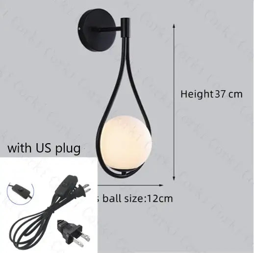 Drop Luxury Glass Ball Wall lamp featuring minimalist design with black metalwork and LED illumination.