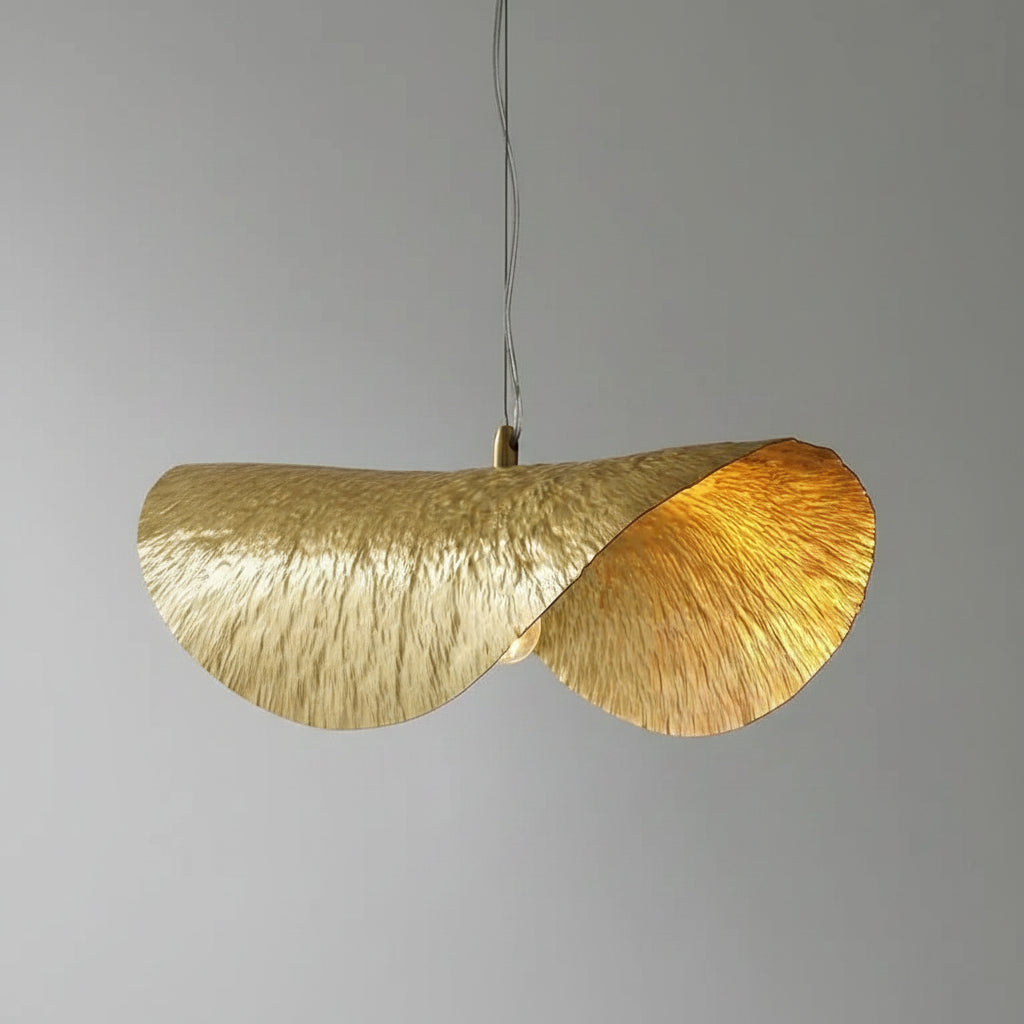 Hero Gold Ginkgo pendant light with textured surface on a gray background