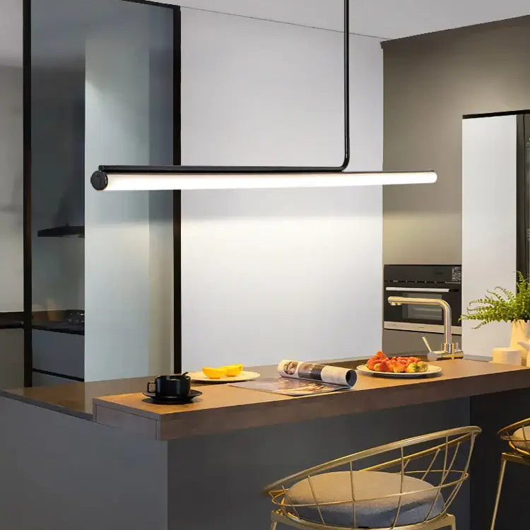 Retro 70s Neon Kitchen Island Pendant in Black or White illuminating a modern kitchen island.