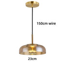 Retro 80s Transparent Large Pendant Lamp with gold accents and a transparent glass shade, 150cm wire length and 23cm diameter.
