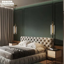 Grey Frosted Sphere Glass Hanging Lamp illuminating a modern bedroom with tufted bed and stylish decor.