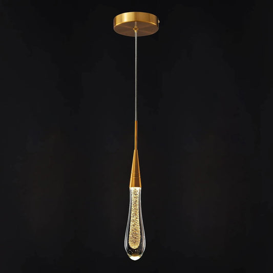 Gold mini teardrop pendant light with a gold metal ceiling plate and slim cone, holding a clear bubble-effect teardrop shade, against a black background