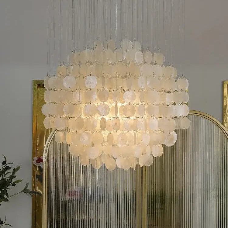 70s Retro Shell Multi-String Light Pendant with luxurious shell accents and warm lighting.