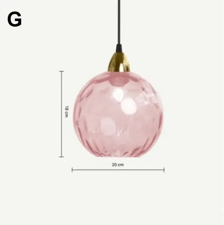 Delicious Lollipop Modern Pendant Light in pink glass ball design with gold accents, elevating any decor.