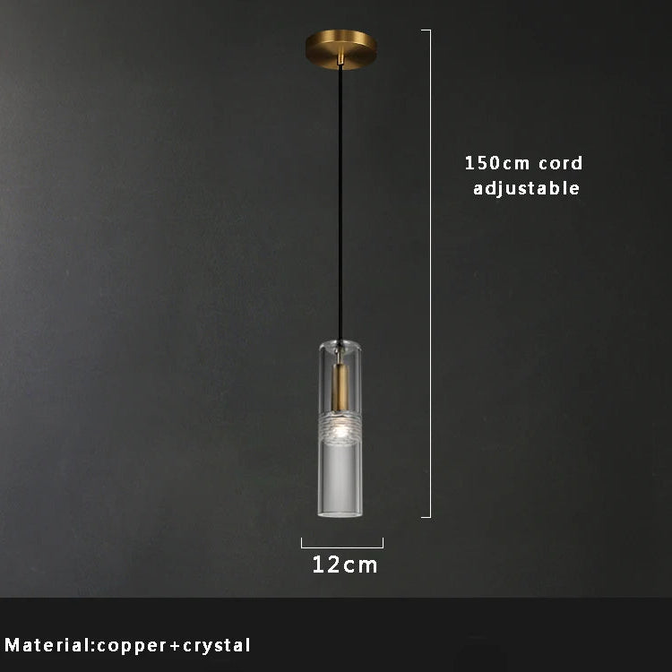 Hero Pendant light with clear glass shade and adjustable cord on a dark background