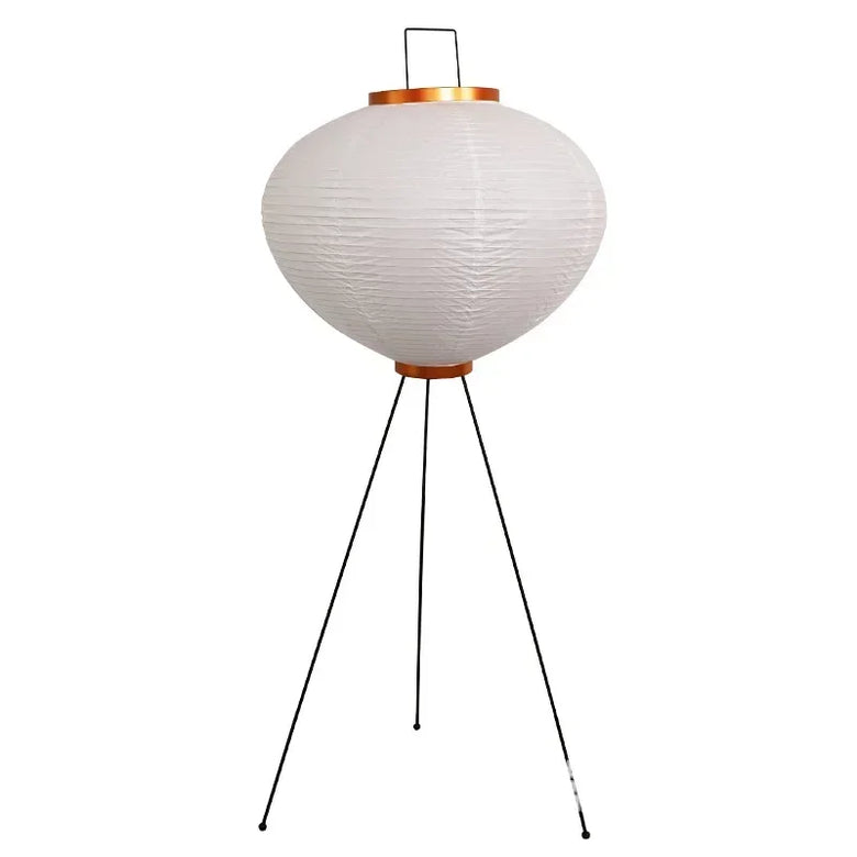 Japanese Rice Paper Lamp. White textured lampshade on a black tripod stand with a white background