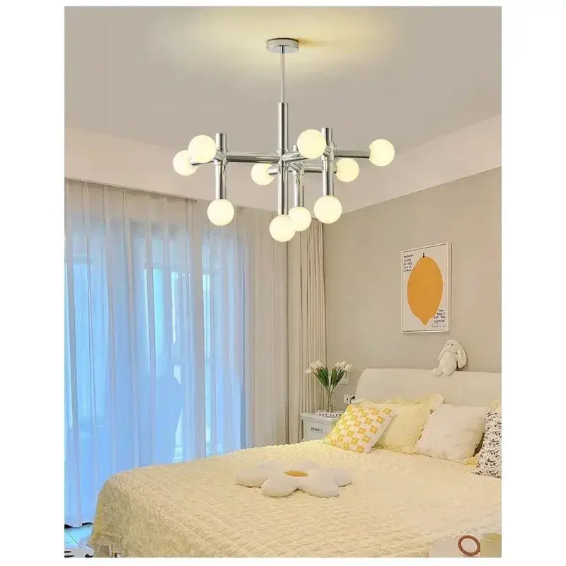 Bauhaus Chrome Chandelier – Modern 10/13 Globe Pendant Light illuminating a stylish bedroom with a cozy aesthetic.