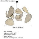 Mid-Century Modern Rattan Wall Light chandelier featuring a unique design of overlapping rattan shapes ideal for home decor.