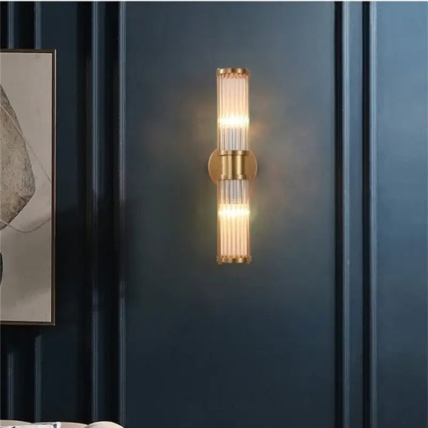 Bathroom Art Deco Brass and Crystal Sconces illuminating a stylish space with elegant lighting.