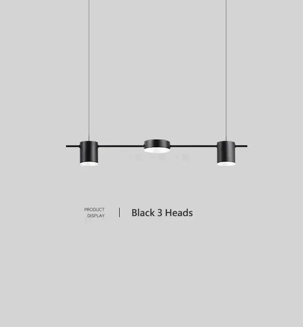 Hanging Minimalism Lights featuring a sleek design with three black heads, suitable for modern interiors.