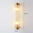 Unique Collection of Art Deco Sconces featuring elegant gold and glass design, perfect for luxurious interior lighting.