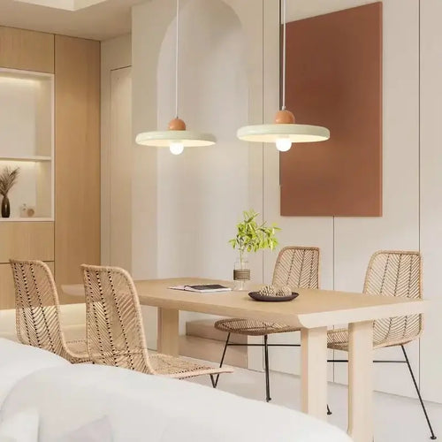 70s Dine In Kitchen Ceiling Light hanging above a wooden dining table in a modern kitchen space.