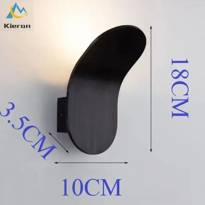 Wall Lamp: Mid-Century Modern Japanese Style, leaf-inspired design with dimensions 18x10x3.5 cm, mounted on a wall.