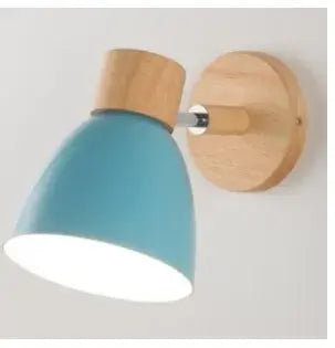 Modern Sconce With Switch featuring a sleek blue lampshade and wooden base, perfect for contemporary decor.