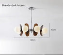 Rare Mid-Century Orange Plexiglass Chandelier: A Unique Vintage Gem - dark brown 8-head design with frosted balls.