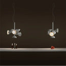 Danish Postmodern LED Chandelier – Sculptural Black Designer Pendant Light illuminating a dark space with artistic design.