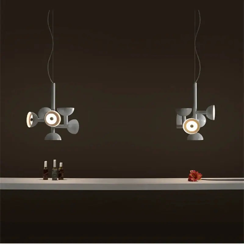 Danish Postmodern LED Chandelier – Sculptural Black Designer Pendant Light illuminating a dark space with artistic design.