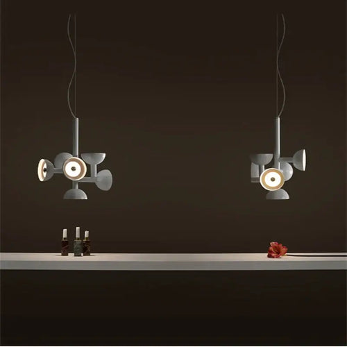 Danish Postmodern LED Chandelier – Sculptural Black Designer Pendant Light illuminating a dark space with artistic design.