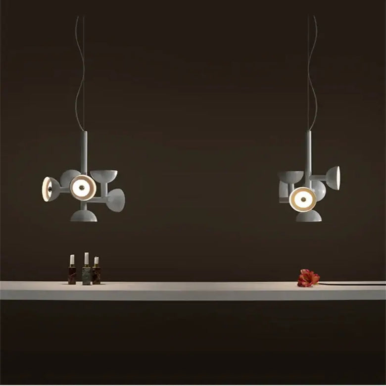 Danish Postmodern LED Chandelier – Sculptural Black Designer Pendant Light illuminating a dark space with artistic design.