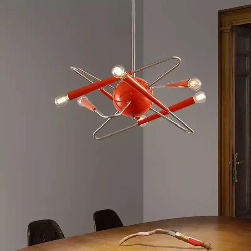 60s Red Sputnik Chandelier in striking red-orange finish, adding a bold retro touch to modern interiors.