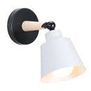 Nordic Solid Wood Bedroom Wall Lamp with modern design and playful black and white finish