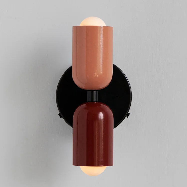 Postmodern Two-Tone Pill Wall Sconce, on black plate