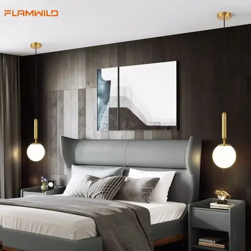 Mid-Century Modern Glass Ball Pendant Light in stylish bedroom setting with modern decor.