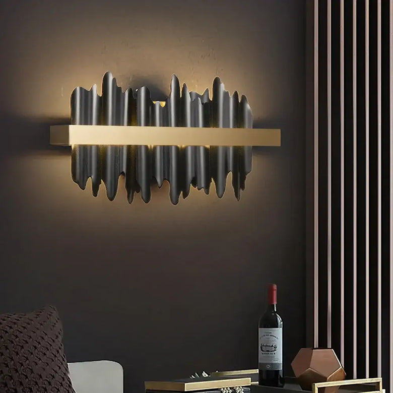 Striking Black and Gold Wall Lamp illuminating a modern interior with up & down lighting effect.