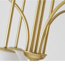 Close-up of the Modern Magic Beans 4-Head Gold LED Chandelier showing gold finish and frosted glass globes.